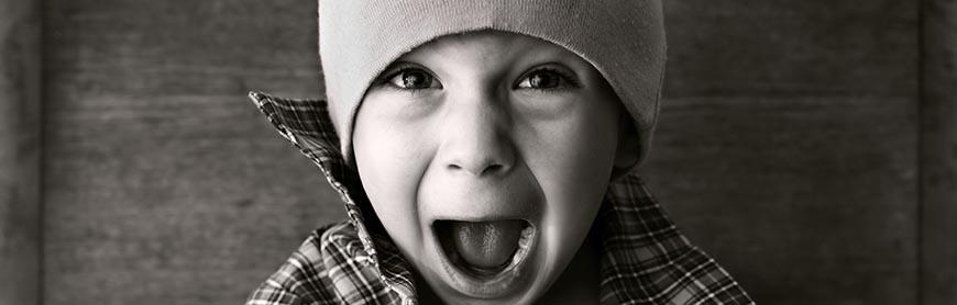 agresja.jpg boy in the hat shouted, black and white photography